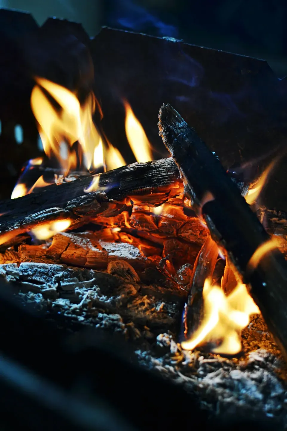 Split firewood with visible flames